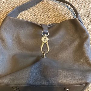 Dooney & Bourke authentic handbag.Gorgeous,multiple pockets. I’ve never used it.